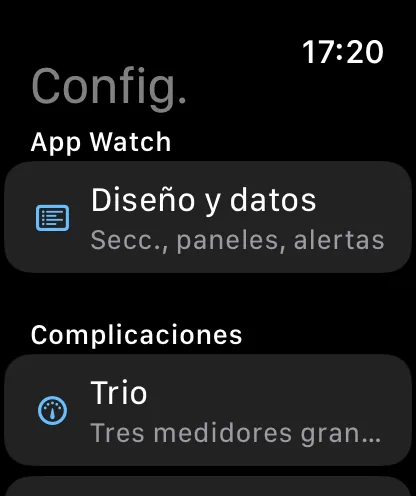 La pantalla Configuración de la app del reloj: una sección App del reloj con Diseño y datos, con el subtítulo Secciones, mosaicos, alertas, y debajo el inicio de la sección Complicaciones con Trio, Tres indicadores grandes.