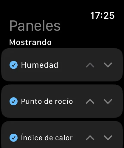 La pantalla Mosaicos en el reloj, con el título Mosaicos y Mostrando, con Humedad, Punto de rocío e Índice de calor marcados, cada uno con chevrones hacia arriba y hacia abajo.