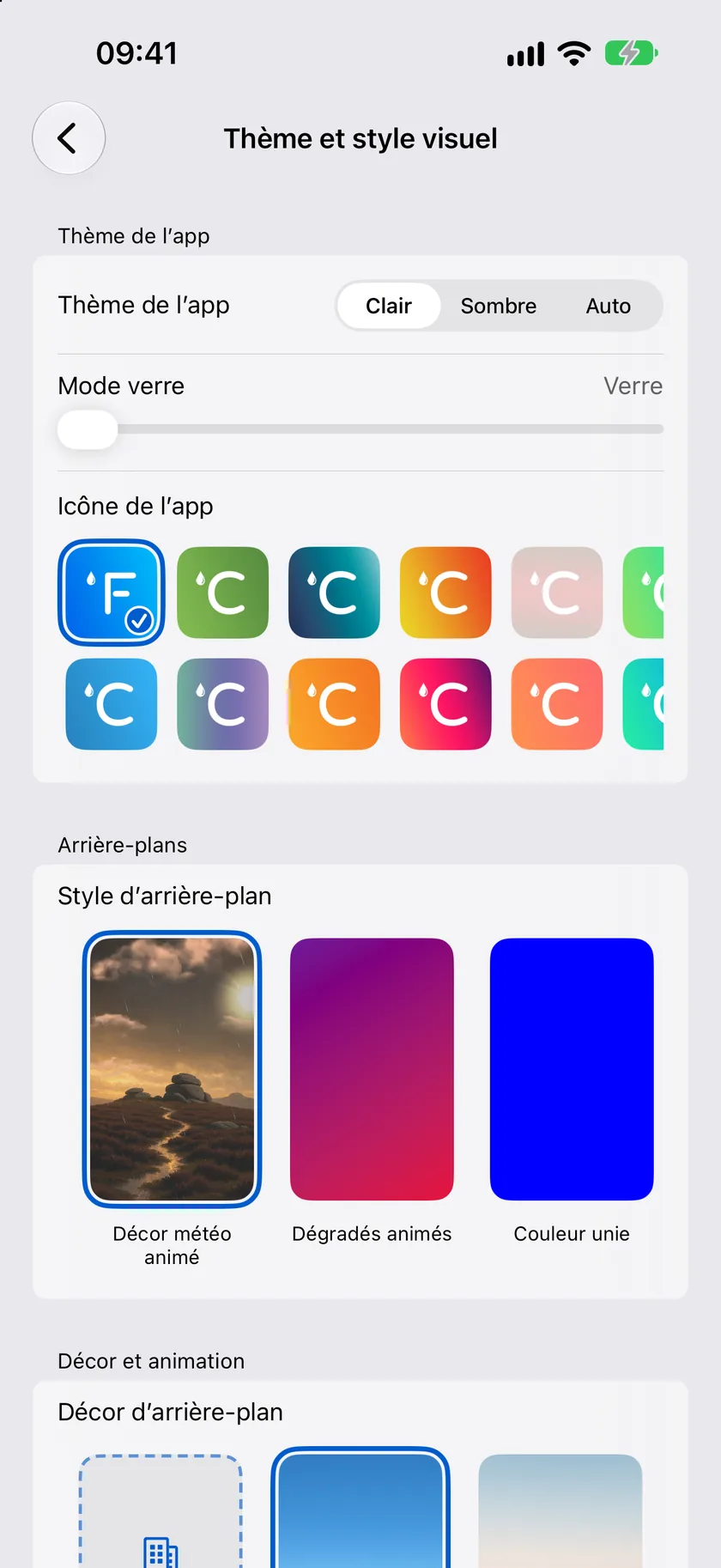 L’écran de réglages Thème et style visuel affichant Thème de l’app, Arrière-plans et les cartes de scènes