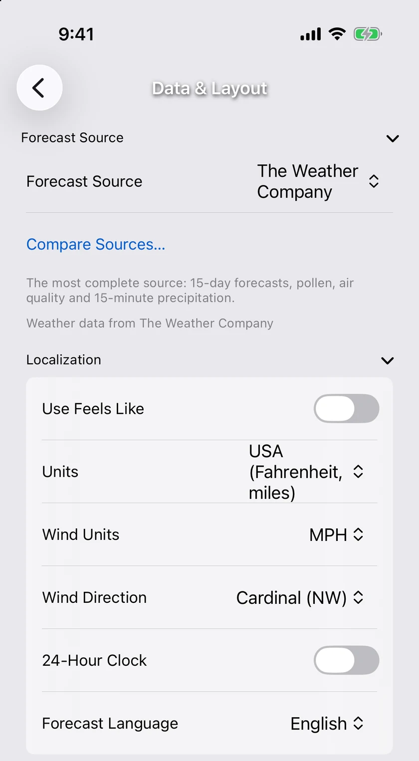 The Forecast Source section at the top of Data & Layout, its picker set to The Weather Company, the Compare Sources… link, and the note describing what the source covers, with the Localization section beneath.