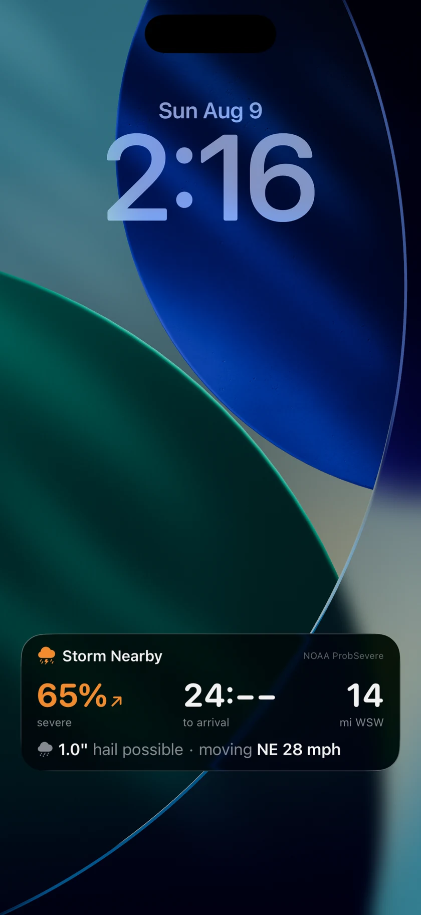 A Storm Intercept Live Activity on the Lock Screen reading 65% severe with an upward trend arrow, a 24 minute countdown, 14 miles west-southwest, and a detail line giving 1.0 inch hail moving northeast at 28 mph