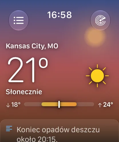 Widok główny aplikacji na zegarek w złotej godzinie: niebo w różowo-bursztynowym gradiencie z ciepłą tarczą słońca nad Kansas City, 72 stopnie i słonecznie.