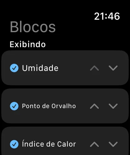 A tela Blocos no relógio, com os títulos Blocos e Exibindo, com Umidade, Ponto de orvalho e Índice de calor marcados e cada um com divisas para cima e para baixo.