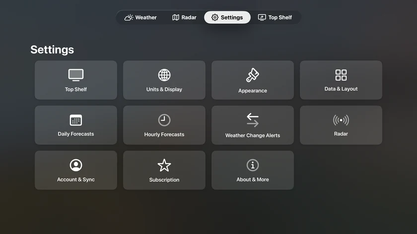 The Apple TV Settings screen with eleven tiles from Top Shelf to About and More.